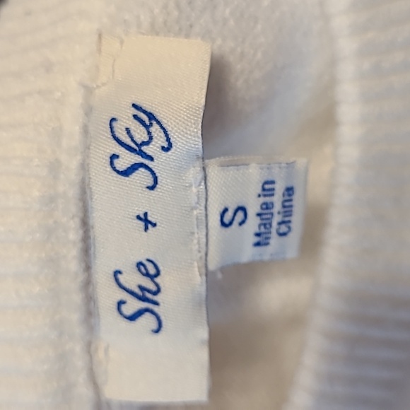 White A Line Sweater Dress with Flutter Skirt - Picture 3 of 4